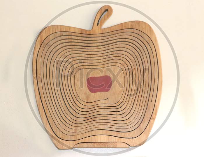 An Apple Designed By Solid Wood, Looks Very Attractive.