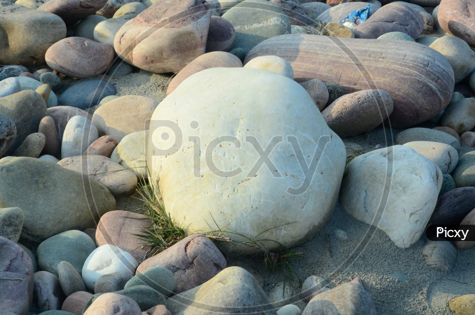 Pebble Stones In a River Bed