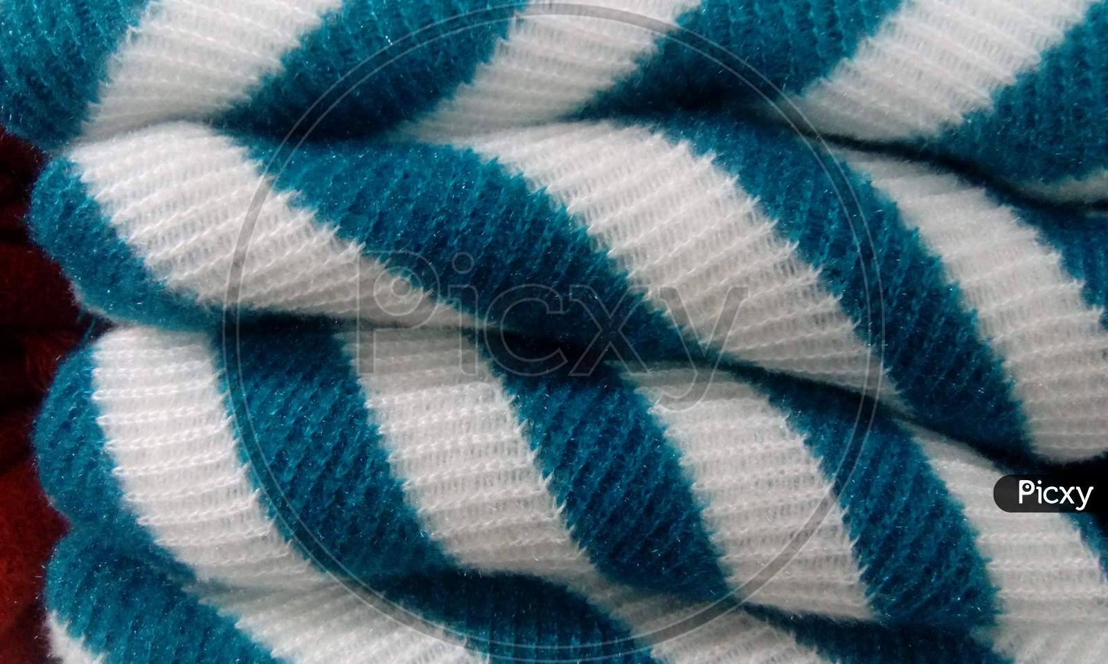 Clothes With Fabric texture In a Closet Of a Store Closeup