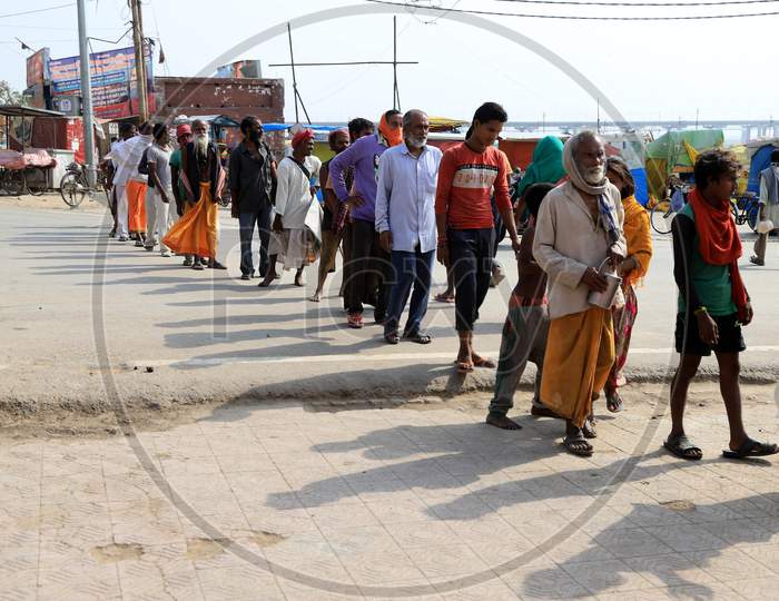 Homeless People Queue To Takes Free Food During A Nationwide Lock down To Slow The Spreading Of The Corona virus Disease (Covid-19), In Prayagraj, April, 19, 2020