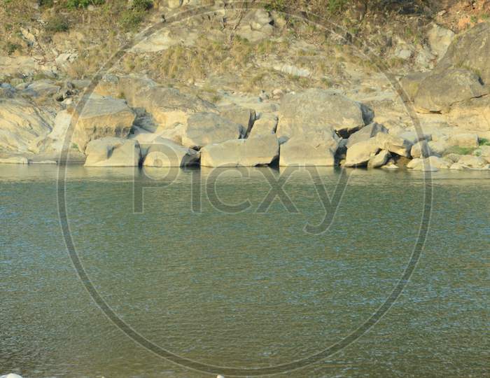 Rock at shoreline of River Himachal Pradas