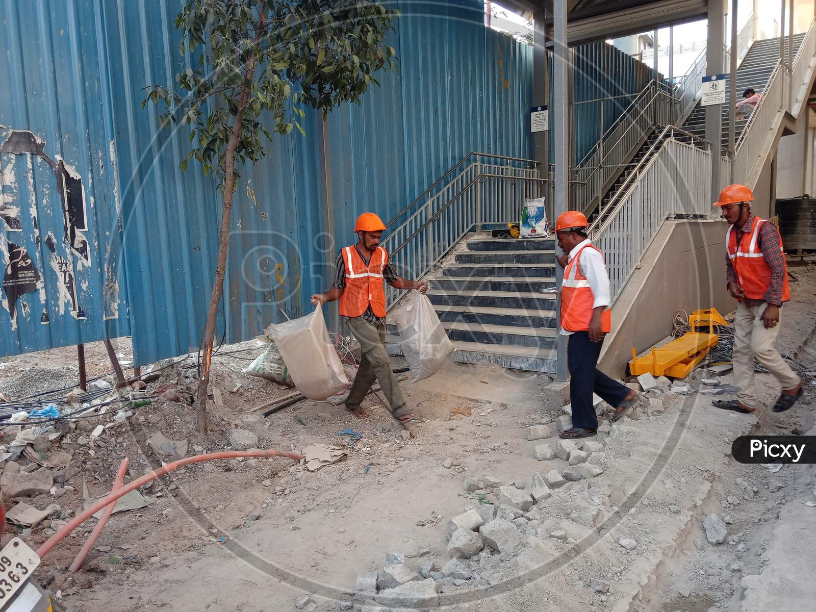 Workers Working At Under Construction Metro Tracks And Metro Stations in Hyderabad