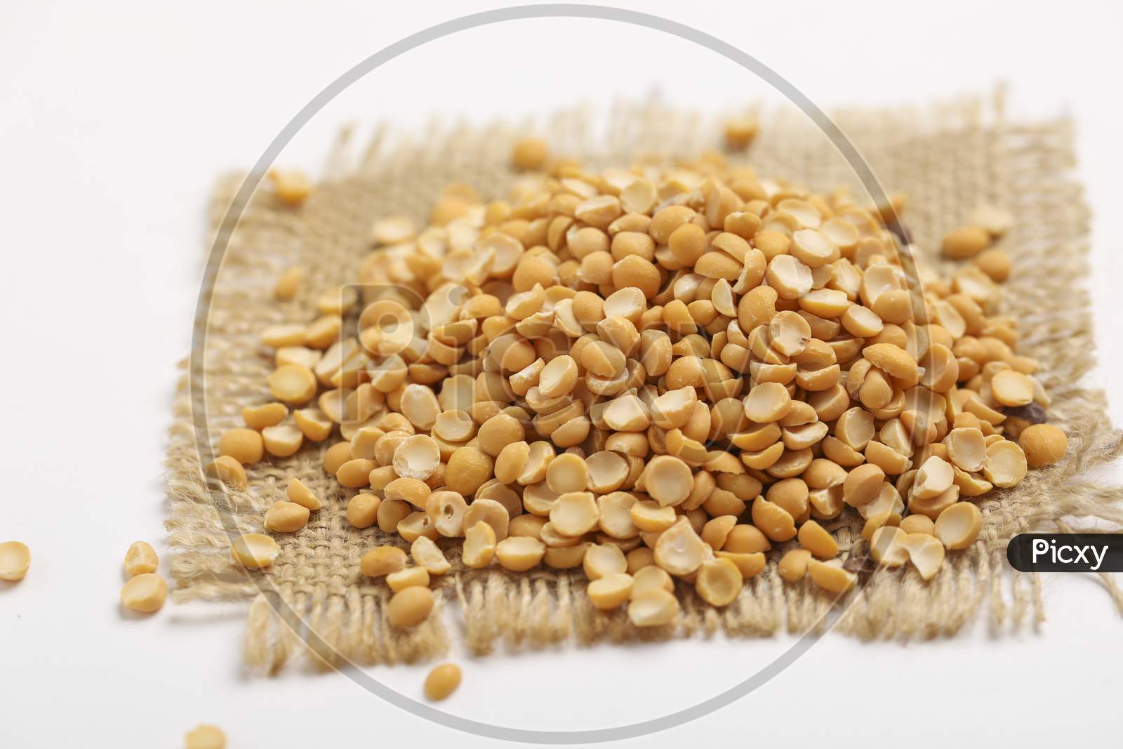 Dried Chickpea Lentils On White Background , Split Chickpea Also Know As Chana Dal ,