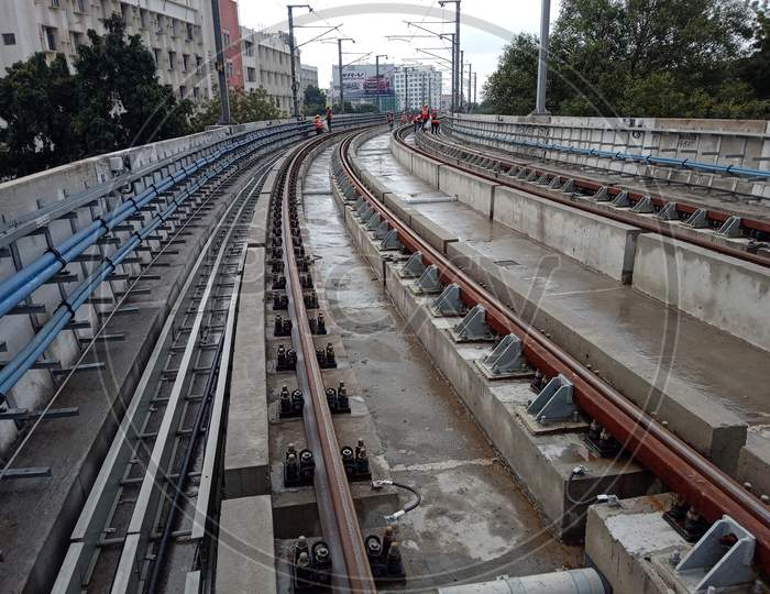 Workers Working At Under Construction Metro Tracks And Metro Stations in Hyderabad
