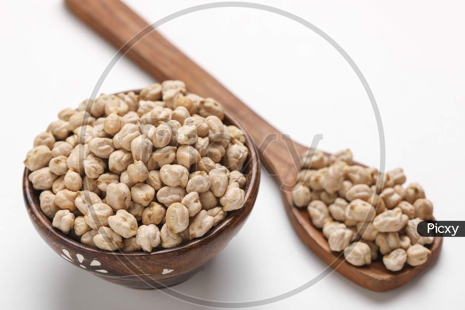 Uncooked Dried Chickpeas In Wooden Bowl And Spoon ,
