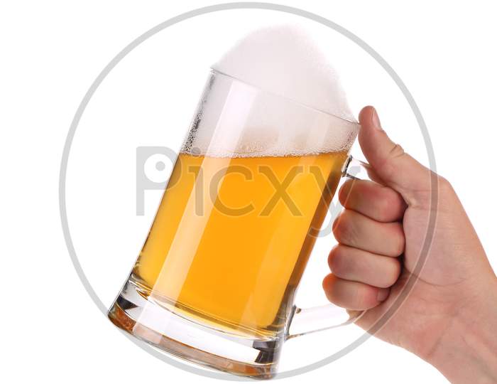 Hand Holds Mug Of Beer With Foam. Isolated On A White Background.