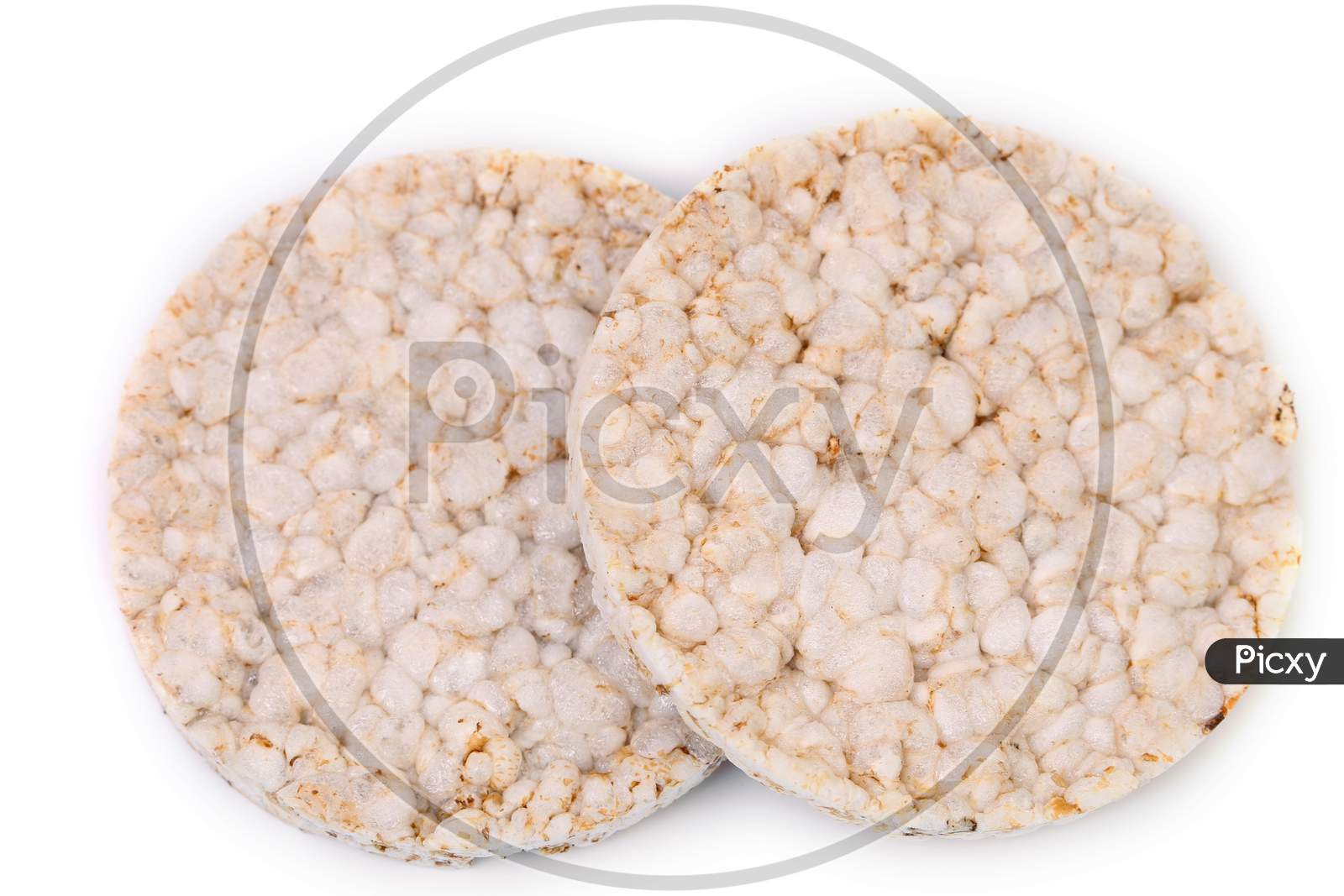 Close Up Of Puffed Rice Snack. Isolated On A White Background.