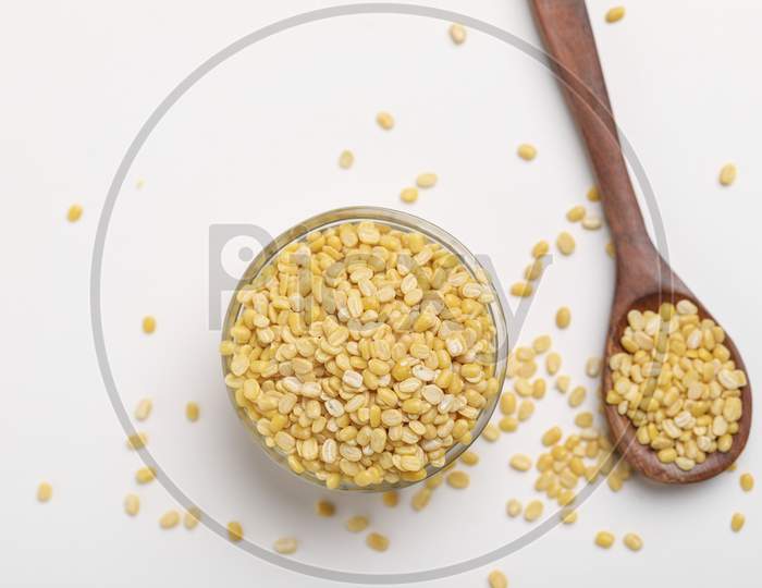 Yellow Moong Mung Dal Lentil Pulse Bean In Glass Bowl On White Background ,