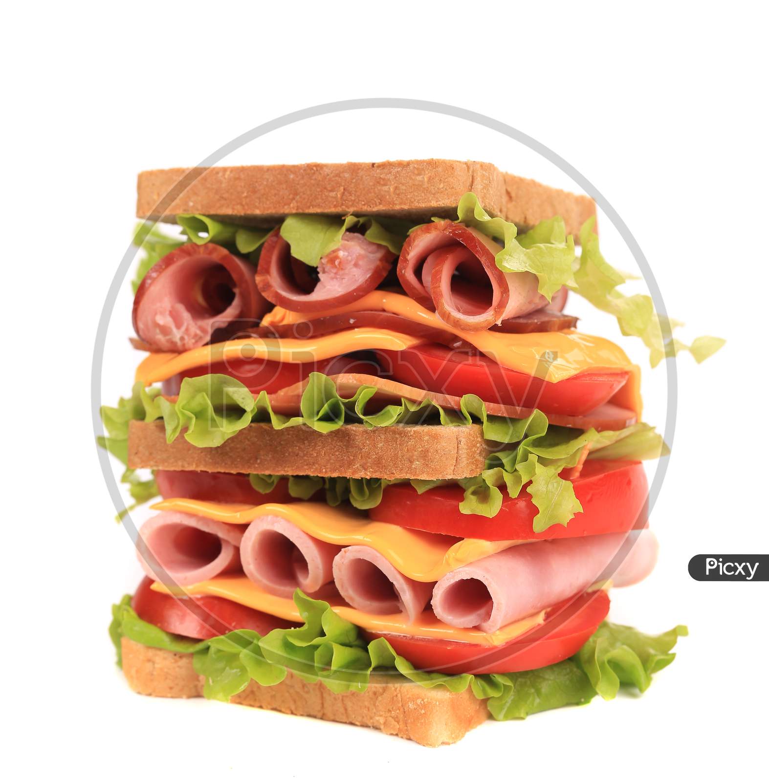 Big Sandwich With Fresh Vegetables. Isolated On A White Background.