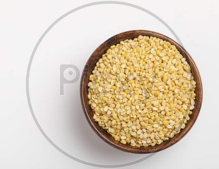 Yellow Moong Mung Dal Lentil Pulse Bean In Wooden Bowl On White Background ,