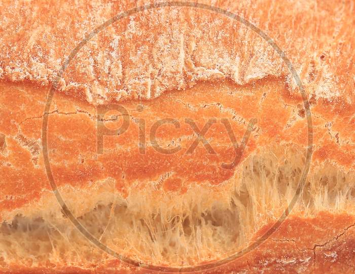 Crackling White Bread. Close Up. Whole Background.