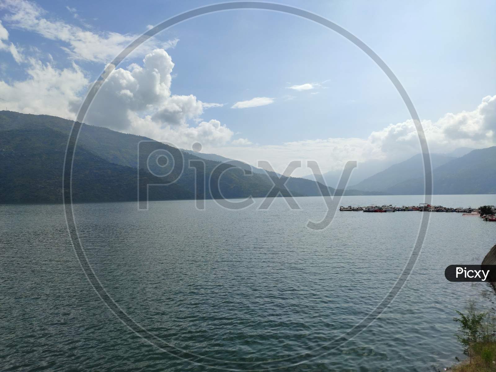 The beautiful lake name is Tehri lake situated in New tehri Uttarakhand, India.