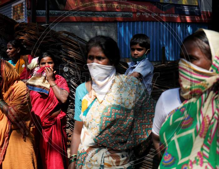 Woman Wearing masks During Corona virus or COVID-19 Pandemic Situation in Bangalore City