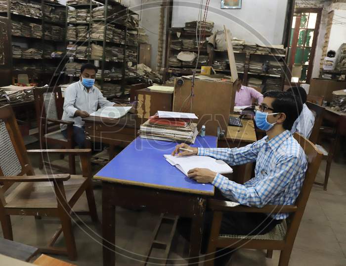 People Work inside an office During a Nationwide Lockdown Amidst COVID-19 or Coronavirus  Outbreak  In Prayagraj, April 20, 2020