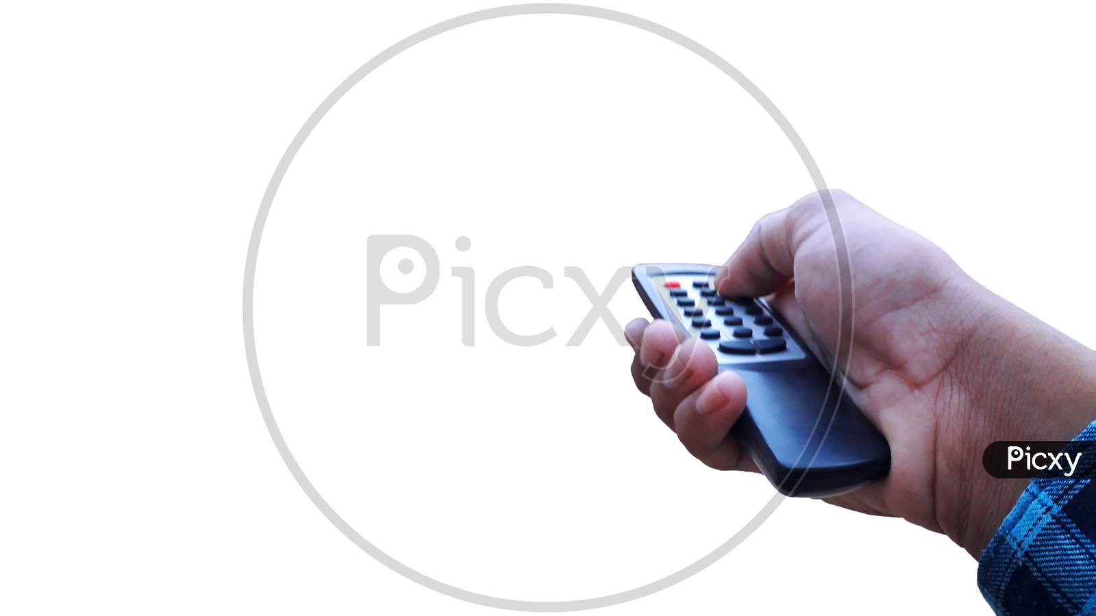 A man holding the TV remote in his hand and pressing its button isolated image in white background