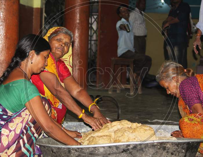 Indian Women Preparing Roti Or Food  in rural Villages