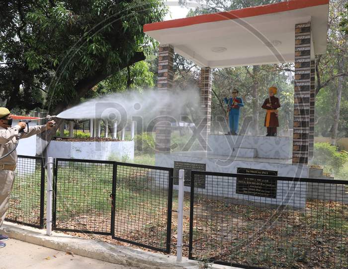 Firefighters Spray Sanitizer on  Dr. B. R. Ambedkar And Swami Vivekananda Statues During a Nationwide Lockdown Amidst COVID-19 or Coronavirus  Outbreak  In Prayagraj, April 20, 2020