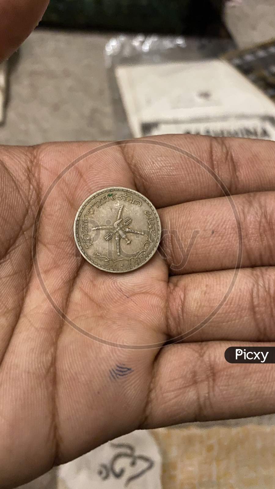 Kwueti coin