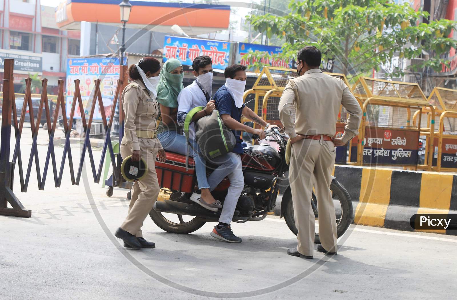 Policemen Checking People Who Come Out On The Road During A Nationwide Lockdown as  Preventive  Measure Of Covid 19 or  Coronavirus In Prayagraj, April 21, 2020