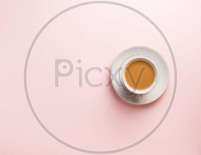 Milk tea  and light pink colour background stock image.