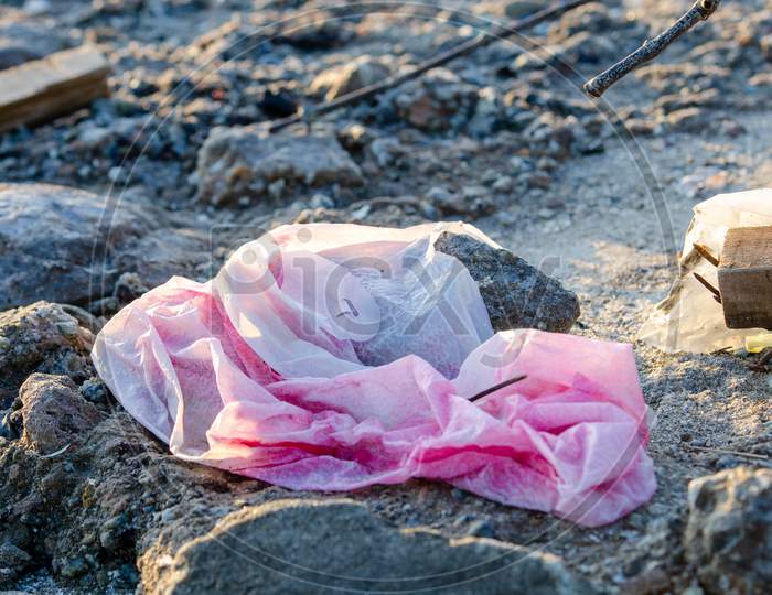 Red Plastic Found At Sea Coast