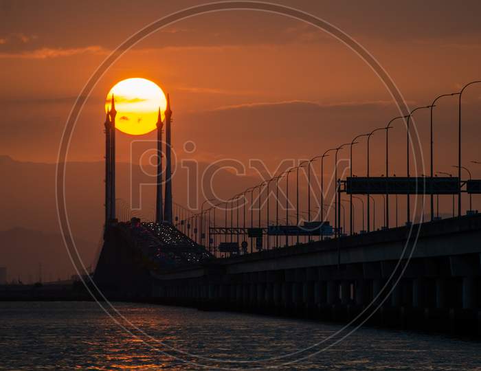 Orange Sun Over Penang Bridge.