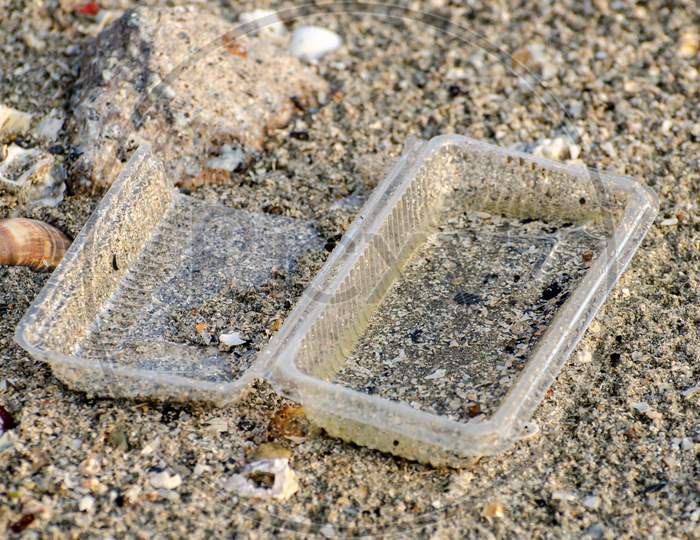Plastic Food Containers Thrown At Beach.