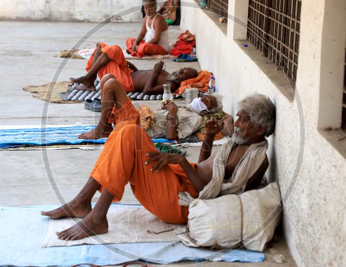 Sadhus Or Holy Men Shelter On The Road Side During Nationwide Lockdown Amidst Coronavirus or COVID-19 Outbreak in Prayagraj