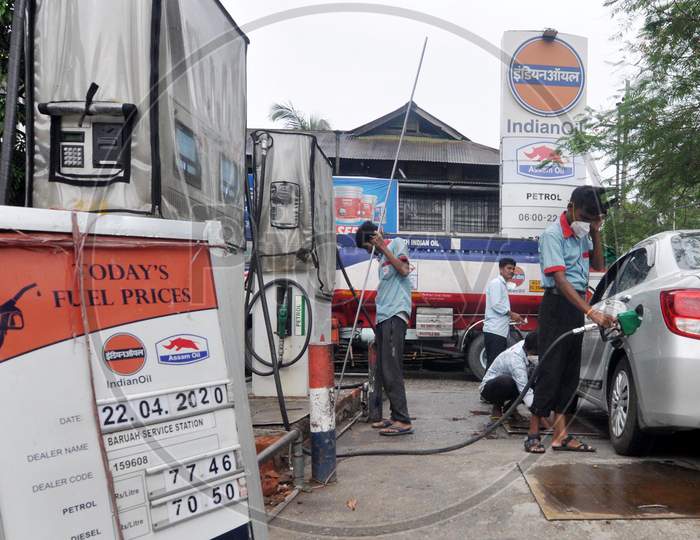 A Worker Re-fuels Petrol In A Car  During The Nationwide Lockdown To Curb The Spread Of Coronavirus, In Guwahati,India 