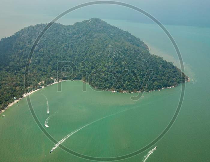 Drone View Tourist On Boat Tour At Penang National Park.