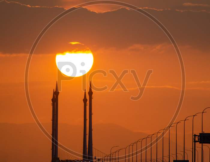 Golden SunRise And Covered By Cloud At Penang Bridge, Malaysia, Southeast Asia.