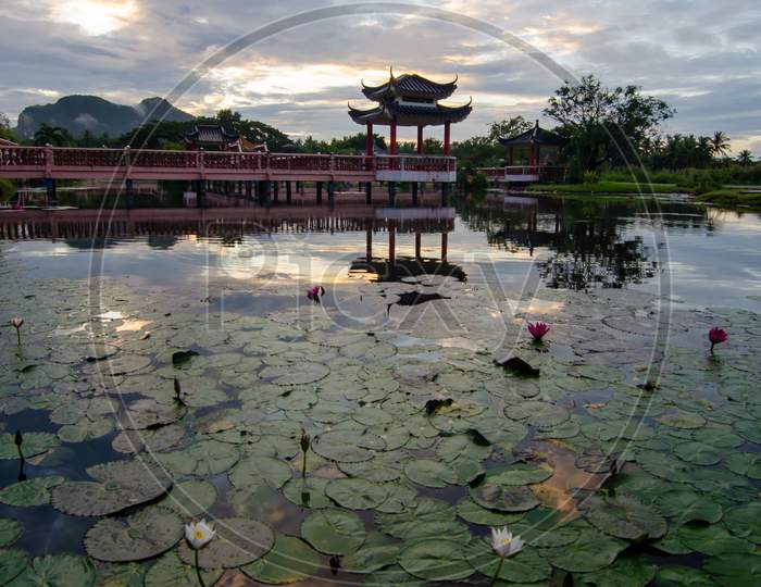 Melati Lake, Perlis, Malaysia Chinese Architechtural Bridge In Morning.