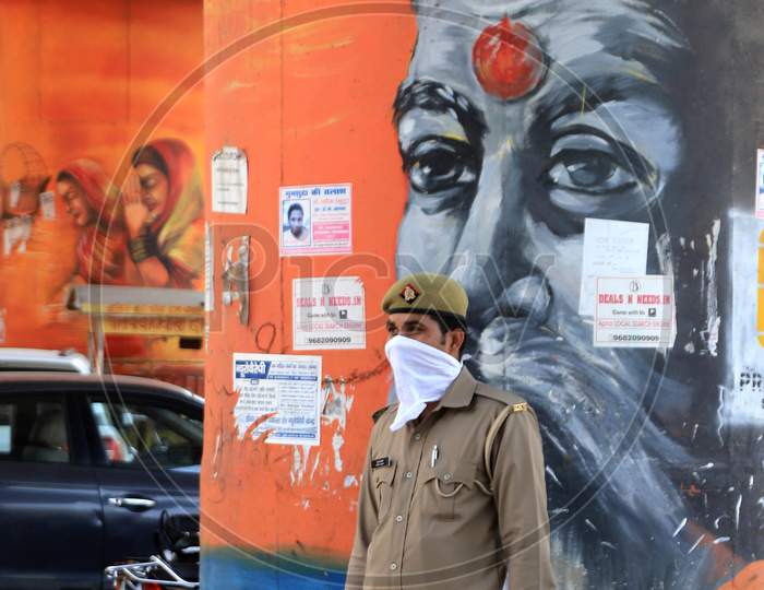Policeman Wearing Mask And Attending Duty During Nationwide Lockdown Amidst Coronavirus Or COVID-19 Outbreak in Prayagraj