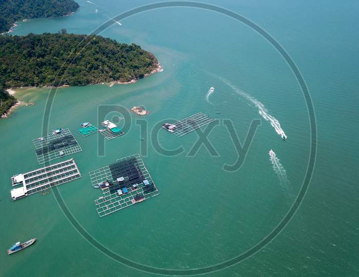 Drone View Fishing Boats Move Near Fishing Farm At Teluk Bahang,
