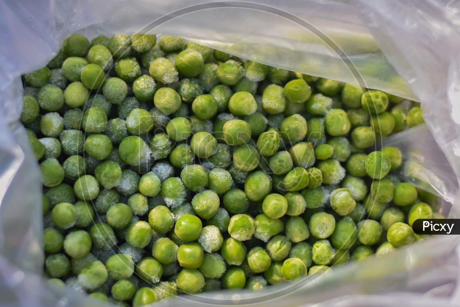 closeup of fresh green peas in the market