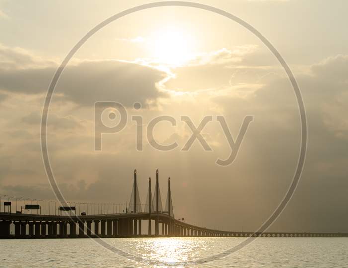 Morning Sun Rays Through The Cloud At Penang Second Bridge.