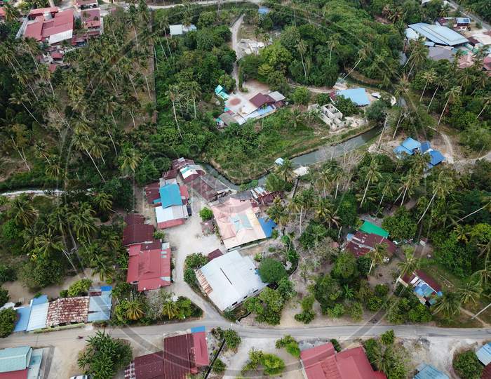 Drone View Malays Village At Rural Area.