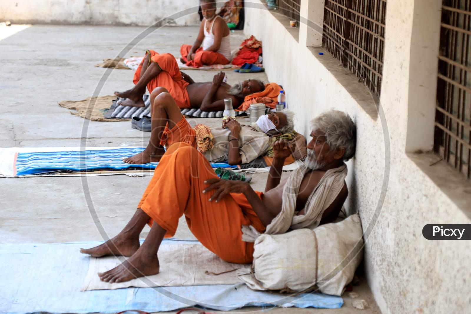 Sadhus Or Holy Men Shelter On The Road Side During Nationwide Lockdown Amidst Coronavirus or COVID-19 Outbreak in Prayagraj
