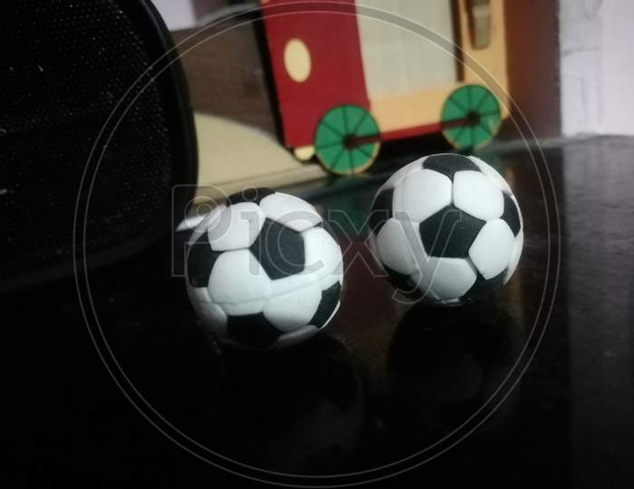 Black and white rubber balls for children playing