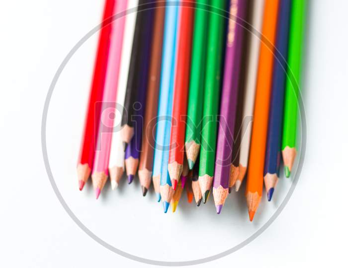 colourful pencils isolated templates to be used as background.