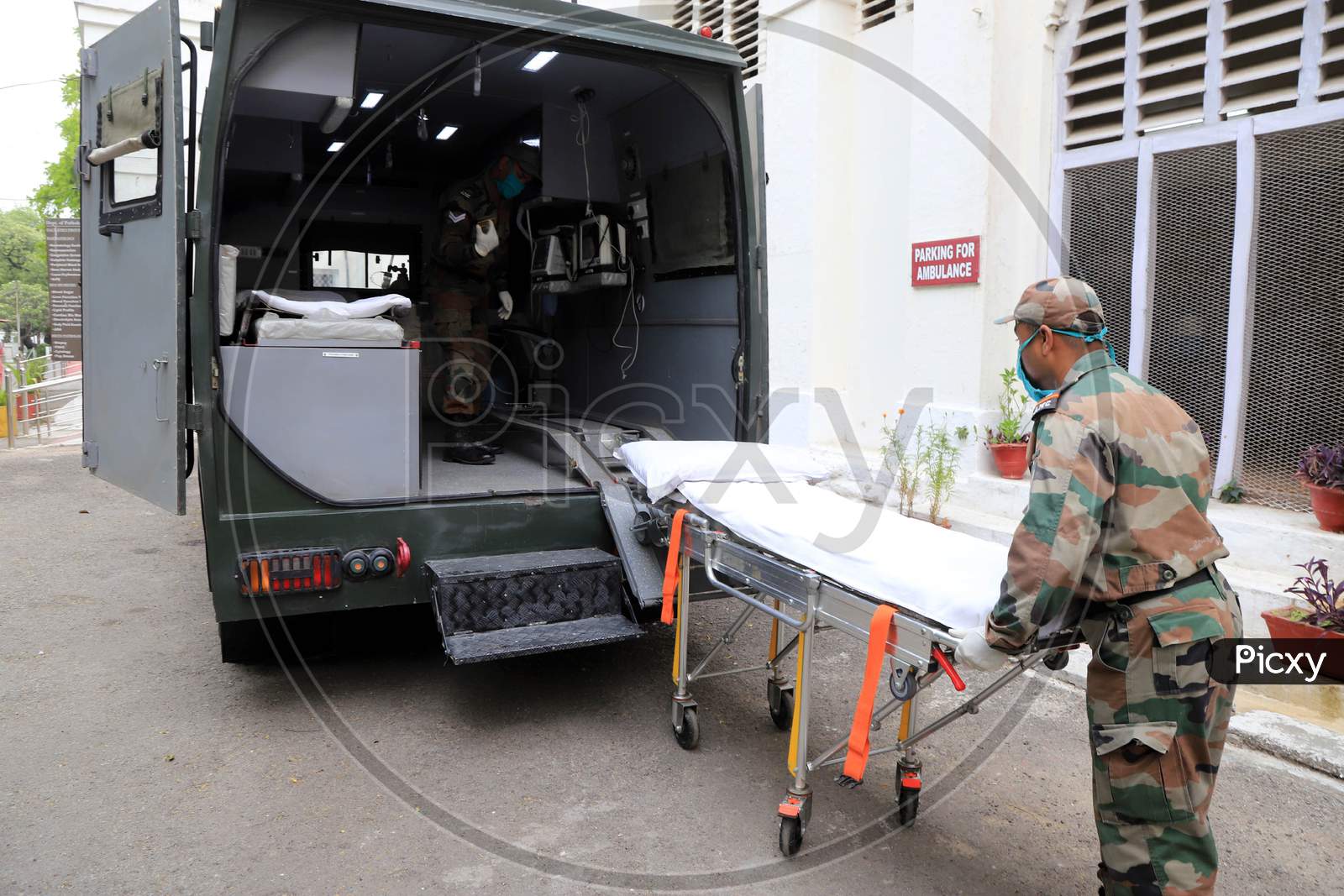Indian Army Soldiers Preparing Special Ambulances For Patients At a Military Hospital  During Nationwide Lockdown Amidst  Coronavirus Or COVID-19 Outbreak In Prayagraj April 23, 2020