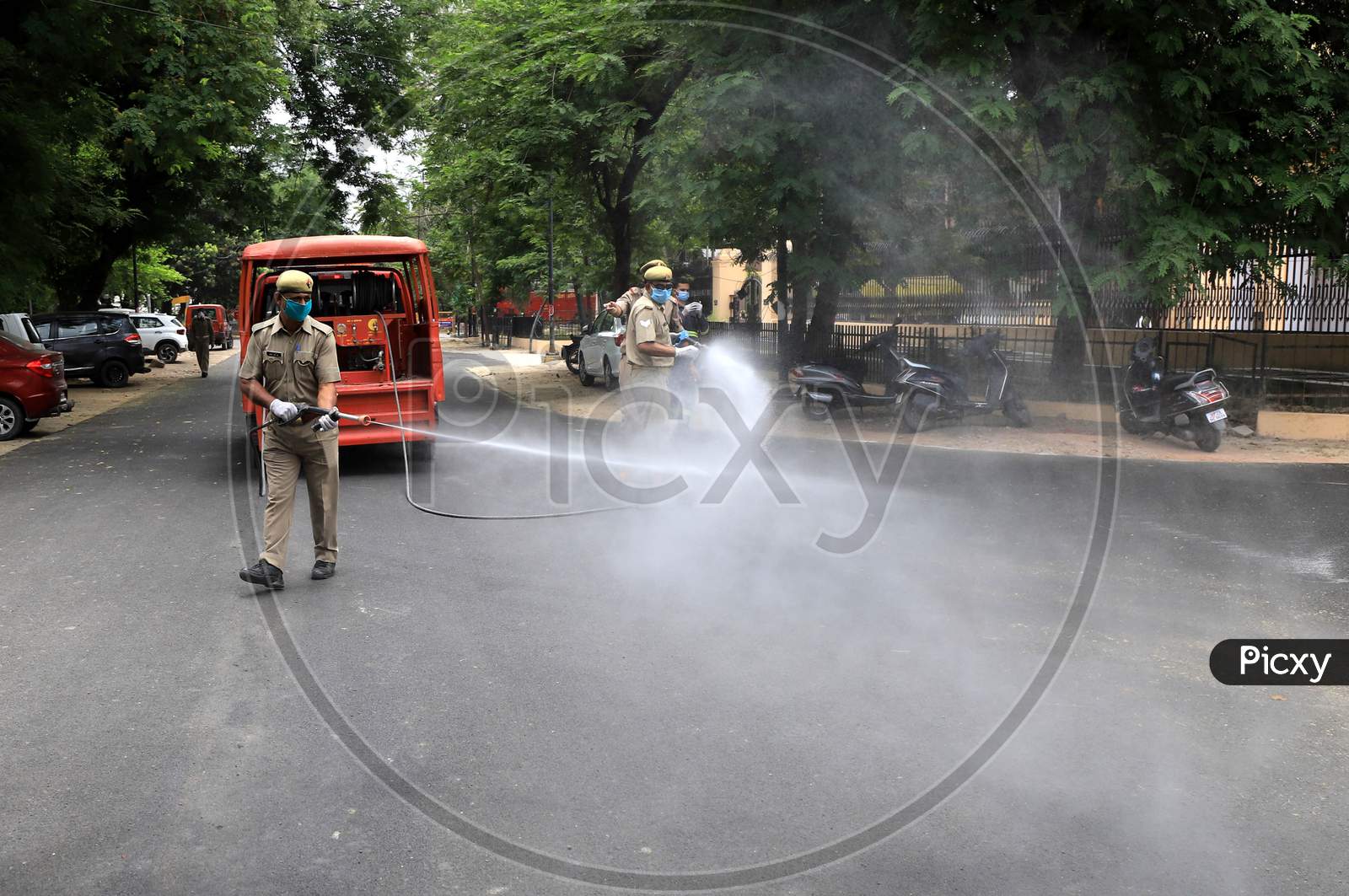 Firefighters Spraying Sanitizers During Nationwide Lockdown Amidst Coronavirus or COVID-19 Outbreak in Prayagraj .April 24,2020
