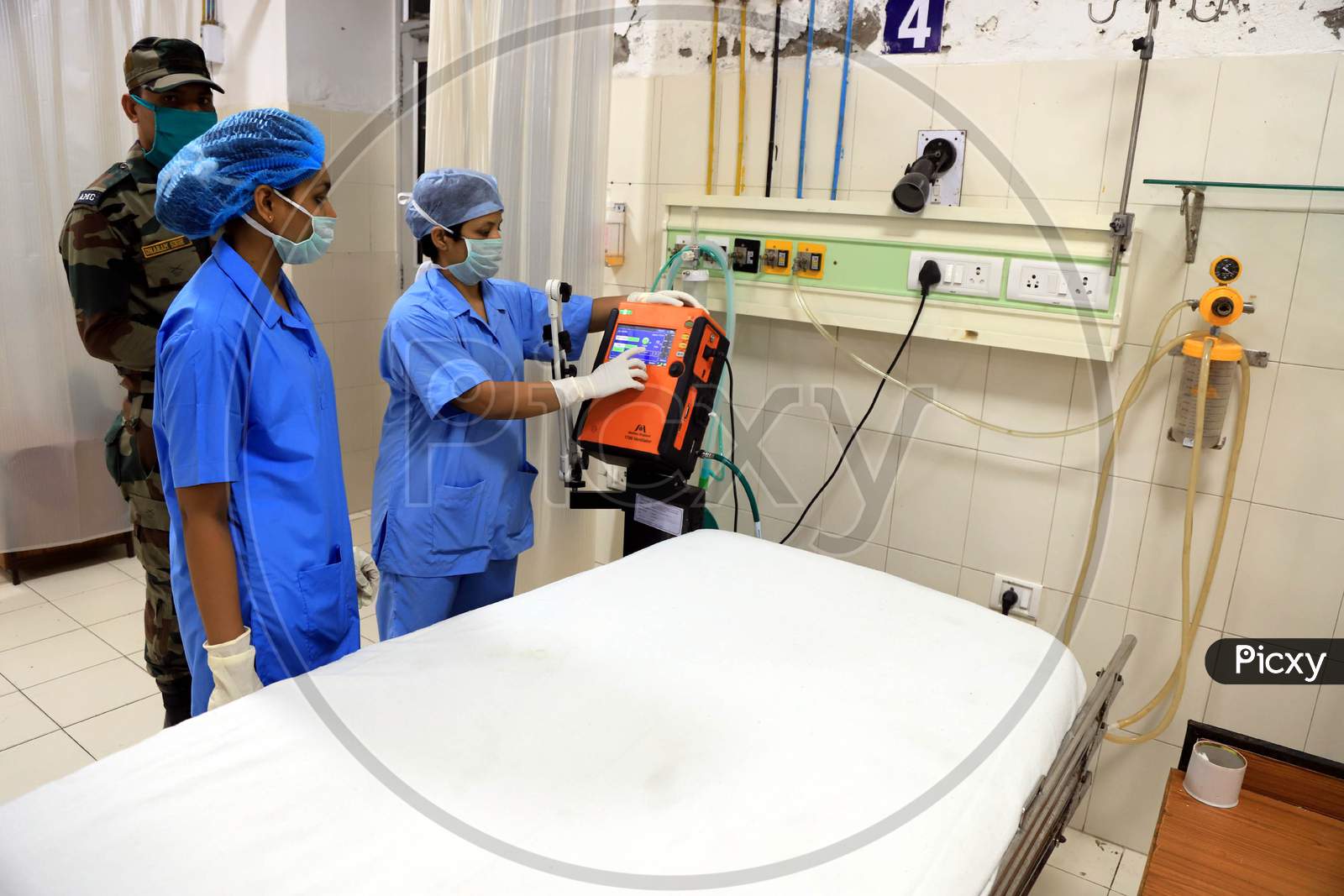 Nurses Set up Beds For Quarantine Wards In an Army Hospital During Nationwide Lockdown Amidst Coronavirus or COVID-19 Outbreak in Prayagraj.April 24,2020