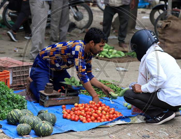 Vendors Selling Vegetables at a Market During Nationwide Lockdown Amidst Coronavirus or COVID-19 Outbreak in Prayagraj .April 24,2020