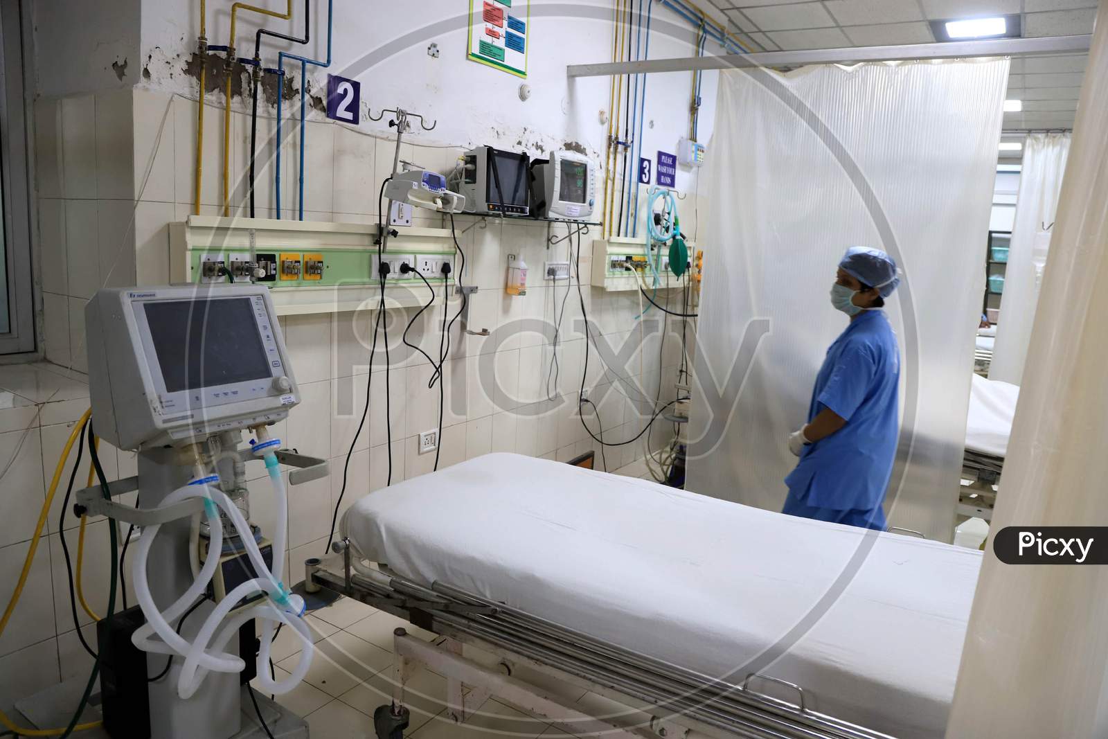 Nurses Setup Beds For Quarantine Wards In an Army Hospital During Nationwide Lockdown Amidst Coronavirus or COVID-19 Outbreak in Prayagraj.April 24,2020