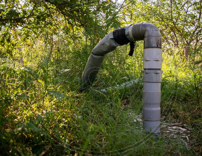 Pipes connected to main irrigation system for irrigation of guava's garden