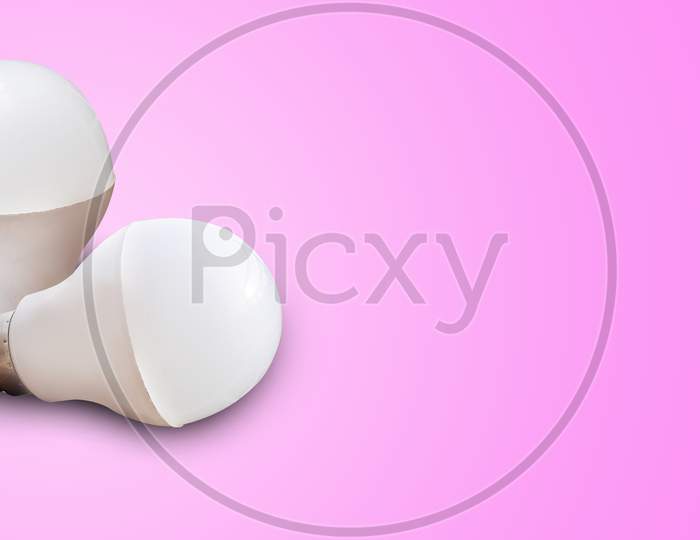 White LED bulb non glowing isolated image in pink background