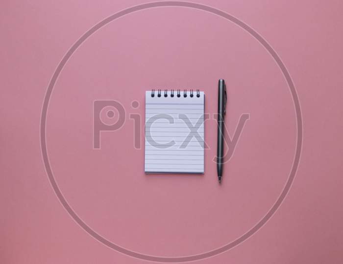 Flat Lay With Notes and Pen On an Isolated Background