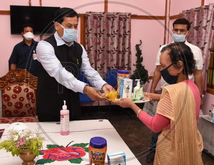 Assam Chief Minister Sarbananda Sonowal Distributing Nutritious Food Items To Inmates Of State Home For Women At Jalukbari In Guwahati On April 26,2020