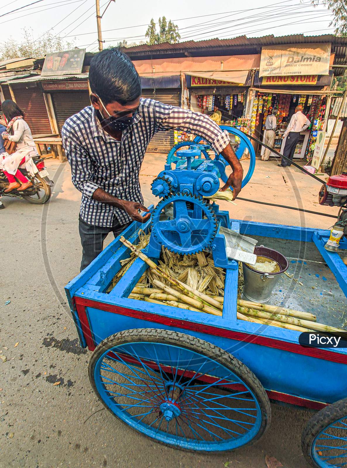 Sugarcane juice Machine on Indian Streets
